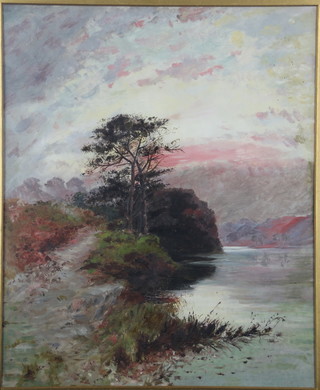An Edwardian watercolour, study of a sunset at lakeside scene with distant hills, unsigned 18" x 14 1/2"  