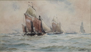 W S Tomkin 1917, watercolour, a maritime study of boats at sea with a distant steamer, signed and dated 5" x 9" 