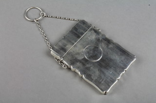 An engine turned silver card case with vacant cartouche on chain, Chester 1913, 82 grams 