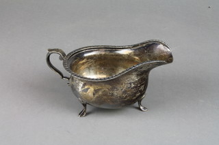 A silver sauce boat with S scroll handle on scroll feet, Sheffield 1921, 150 grams