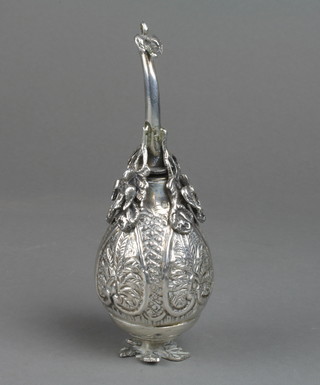A Persian silver rose water bottle of pear shape with bird spout and floral base, 114 grams