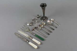A silver pusher, Birmingham 1934, a ditto spill vase, 4 silver spoons and a silver napkin ring, minor items