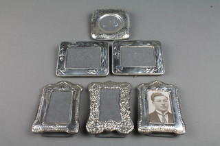 A Continental silver hammer pattern photograph frame 3", 5 others