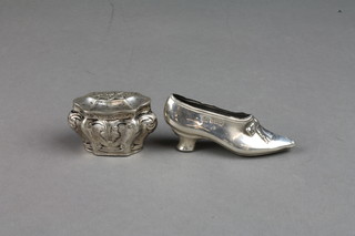 An Edwardian silver pin cushion in the shape of a shoe, a Continental baluster box