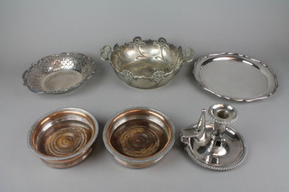 A pair of silver plated coasters with gadrooned rims, a ditto chamber stick and 3 other items