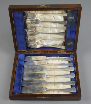 A cased canteen of silver plated fish eaters for six