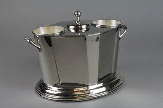 A contemporary silver plated 2 bottle wine cooler with twin handles