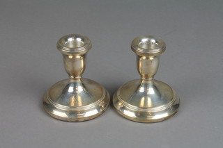 A pair of modern dwarf silver candlesticks 4" 