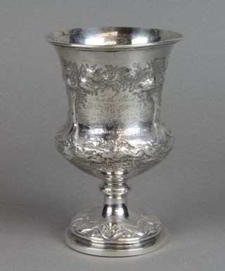 A mid Victorian repousse silver presentation cup decorated with cattle in an extensive landscape with presentation inscription "For The Best Bull, Cow and Progeny, The County of Brecon in the Year 1839, The Gift of John Parry De Winton Esq, of Maes Derwen" London 1839, 214 grams 6" 