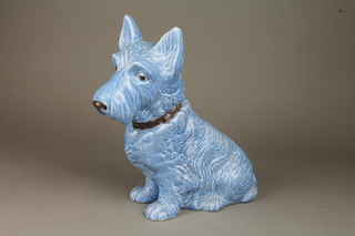 A blue Sylvac figure of a seated West Highland Terrier with original label no.1209 12" 