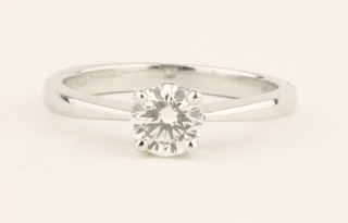 An 18ct white gold single stone diamond ring, approx. 0.75ct, size M