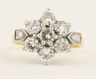 An 18ct yellow gold diamond cluster floral ring, approx. 1.5ct, size M