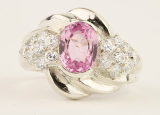 A pink Topaz and white sapphire silver dress ring, size K 1/2