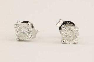 A pair of 18ct white gold diamond ear studs with screw backs, approx. 0.9ct 