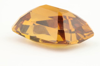 An octagonal cut orange citrine stone, approx 32ct 