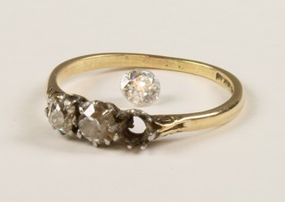 An 18ct gold 3 stone diamond ring, size Q