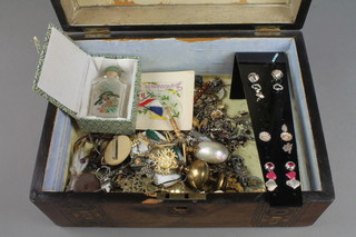 A Victorian parquetry work box containing a quantity of costume jewellery 
