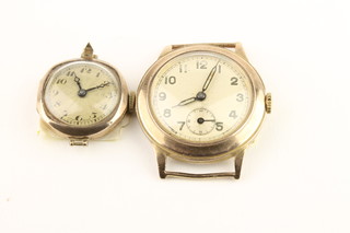 A gentleman's stylish 9ct gold wristwatch and a lady's ditto 