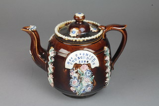A Victorian Bargeware teapot - Mrs C Smith Churchdown 1890 with typical polychrome floral decoration 7" 