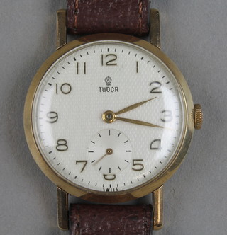 A gentleman's 9ct gold Tudor wristwatch with seconds at 6 o'clock and presentation inscription