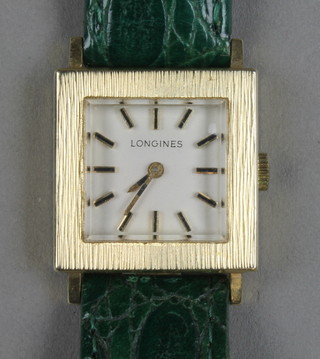 A gentleman's small 14ct bark finished Longines wristwatch on a green leather strap 