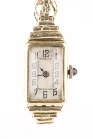 A lady's 14ct gold wristwatch on a plated strap with cabouchon winder 