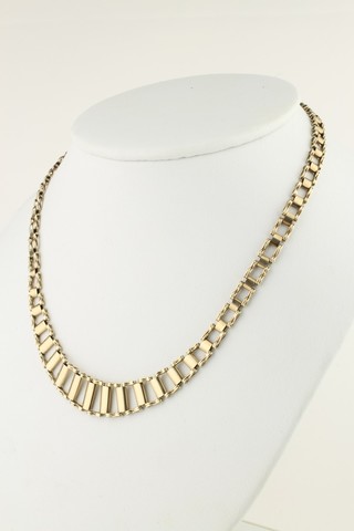A 9ct gold open graduated necklace, 18 grams 
