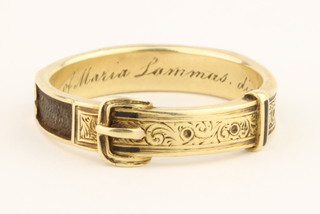 A 19th Century high carat gold memorial buckle ring, size Q 1/2, dated 1875