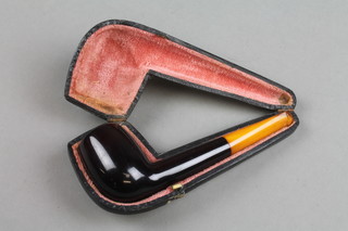 An Edwardian cased pipe with amberoid mouth piece