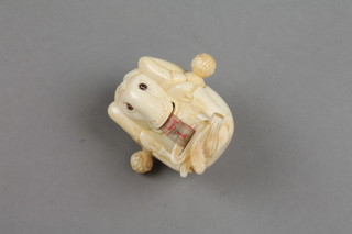 A modern carved bone tape dispenser in the form of a horse 2" 