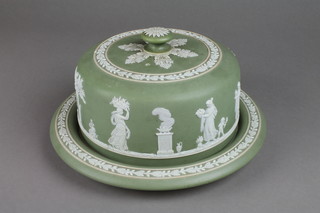 A 19th Century Wedgwood green Jasper cheese dish and cover decorated with a panel of classical figures and cherubs 9" 