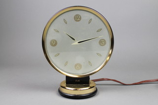A Smiths Jaeger electric mystery clock with 7 1/2" circular glass gilt dial in a gilt metal frame  