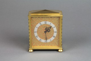 Saint Blaise, an 8 day timepiece with silvered chapter ring and Roman numerals, contained in a gilt metal case 