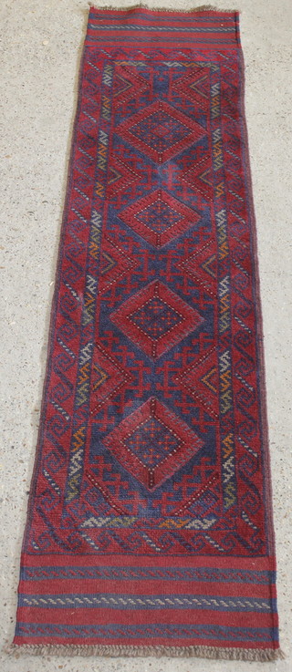 A Meshwani runner with 4 diamonds to the centre 104" x 23" 