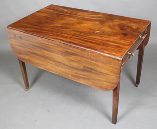 A 19th Century mahogany Pembroke table fitted 2 frieze drawers, raised on square tapered supports ending in brass caps and castors 27"h x 23"w when closed, by 46"w when open x 39"d