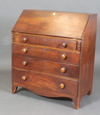 A George III mahogany bureau with well fitted interior, the fall front above 4 long drawers with tore handles, raised on bracket feet 41 1/2"h x 36"w x 20"d 