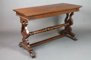 A William IV rectangular mahogany side table raised on pierced lyre shaped supports and scroll feet, with turned and plain stretcher, 29"h x 14"w x 22"d 