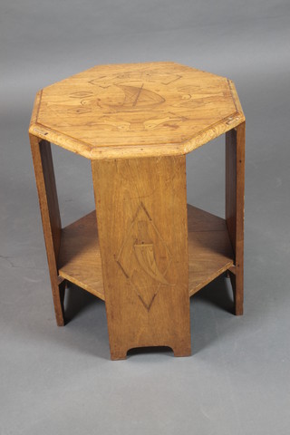 A Liberty's style inlaid oak octagonal 2 tier occasional table, inlaid a sailing boat and fish 22"h x 18"w x 17 1/2" 