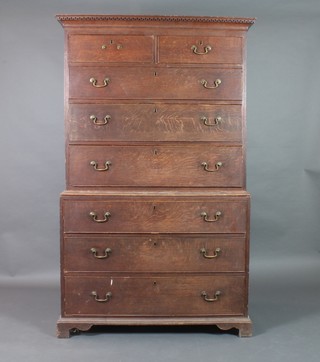 A George III Country oak chest on chest with moulded and dentil cornice, the upper section fitted 2 short and 3 long drawers, the base fitted 3 long drawers raised on bracket feet 71"h x 43"w x 23"d  