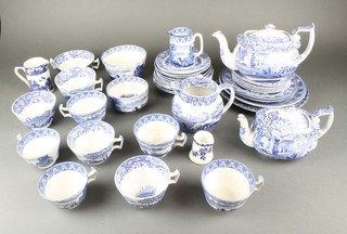 A matched Copeland Spode and Cauldron part tea service comprising 1 large teapot, 1 small teapot, 4 jugs, 8 tea cups, 2 sugar bowls, 2 handled cup, 11 saucers, 6 small plates, 3 medium plates, 2 dinner plates 