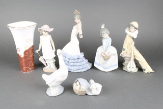 A Lladro group of a goose and goslings no.4895 3 1/2", 5 Nao figures and a Wedgwood vase 