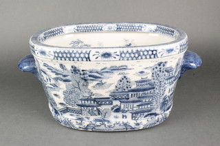 A 20th Century Chinese foot bath decorated with an extensive landscape scene with twin handles 18" 