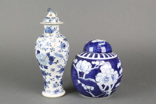 An early 20th Century prunus blue and white ginger jar and cover 6 1/2" and a late 19th Century Chinese oviform vase with birds and insects amongst flowers, 4 character mark to base 9" 