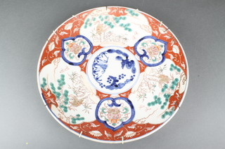 A 19th Century Imari wall plate decorated with figures and flowers 16" 