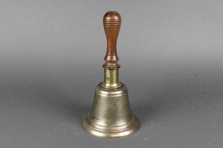 A 19th Century brass hand bell with turned lignum vitae handle 