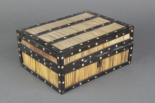 A porcupine quill and ebony box with hinged lid 3"h x 8" w x 6"d