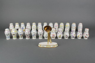 A set of 26 Lennox China herb jars and covers with stand and measures
