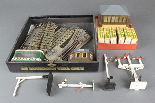 A Crescent double gantry railway signal, a Crescent signal, a Hornby Meccano signal and various Merit O gauge accessories including suitcase, truck and trolley, cabin trunks etc 