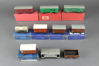 10 items of Hornby OO rolling stock comprising 4323 SR 4 wheeled utility van, 4316 Southern Railways SR horsebox x 2 (1f), contained in red boxes, a Hornby Dublo horsebox D1, do. wagon, D1 goods wagon, D1 meat wagon, D1 fish van, D1 petrol tank wagon, all in green boxes together with an open truck and a brake van - unboxed