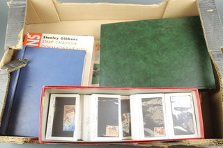 A collection of loose Egyptian stamps, a stock book etc 
